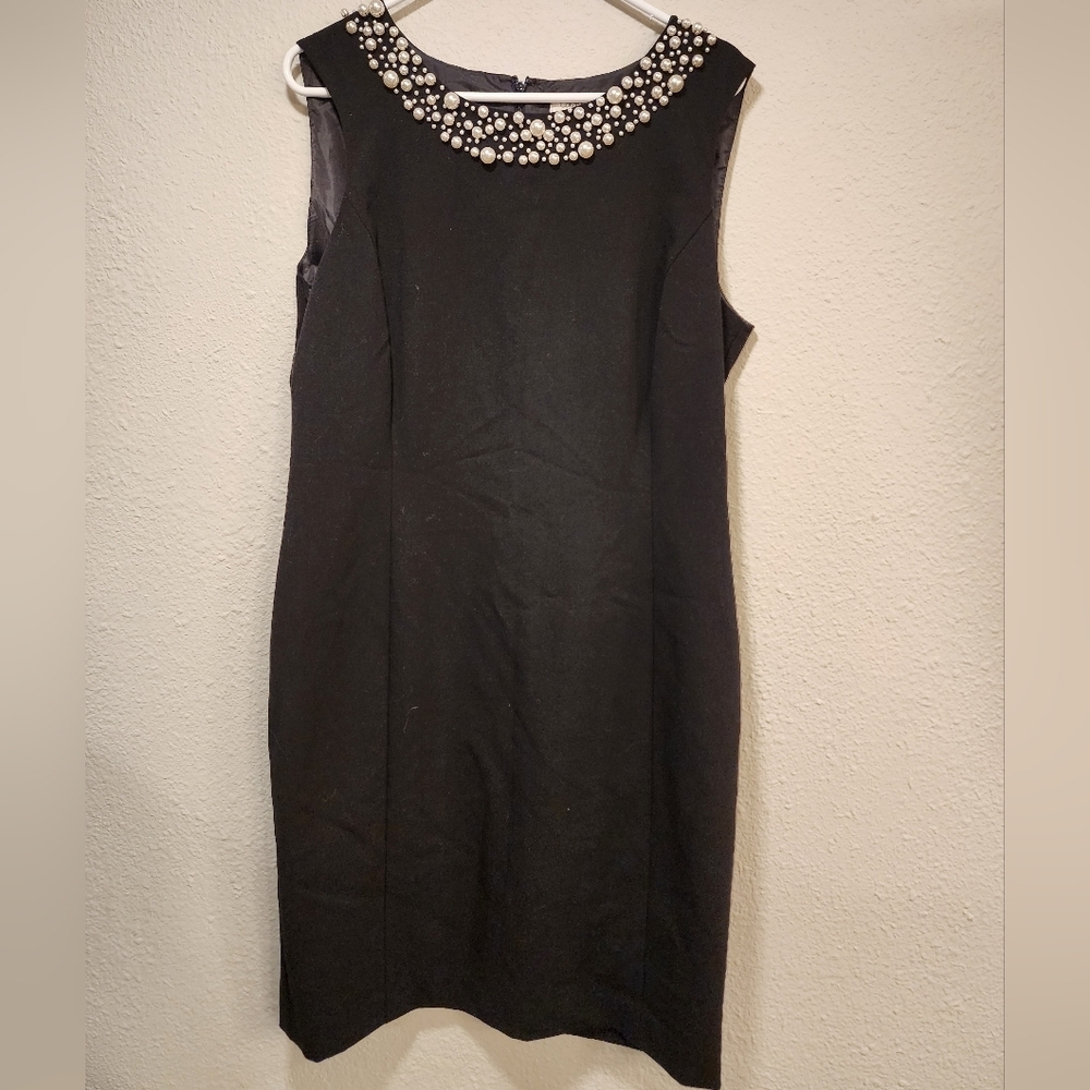 Women's Elegant Black Sleeveless Dress with Embellished Neckline